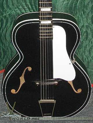 Silvertone Acoustic Guitar. Silvertone World - Acoustic